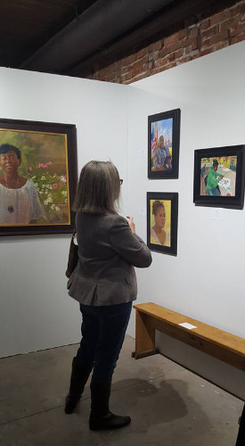 A Woman Admiring the Aplachicola Art